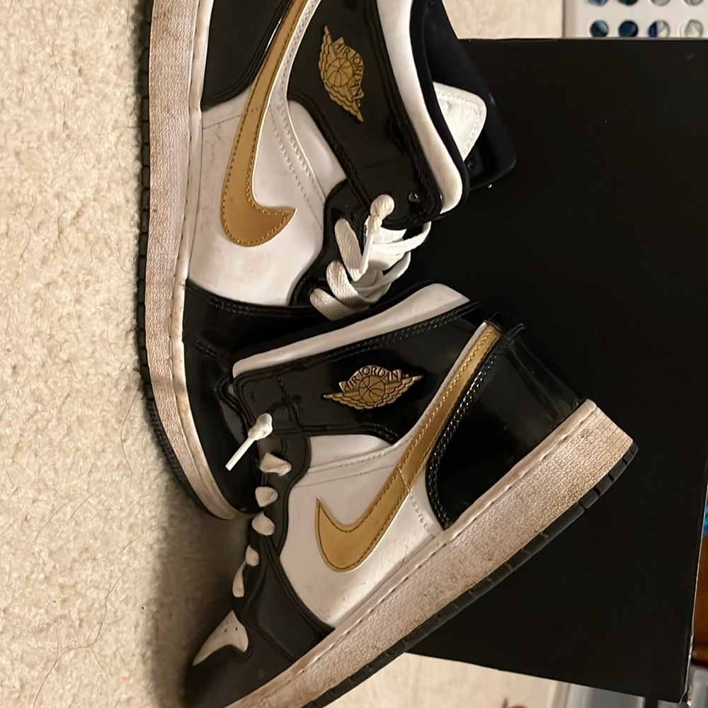 Black,white and gold Jordan’s
